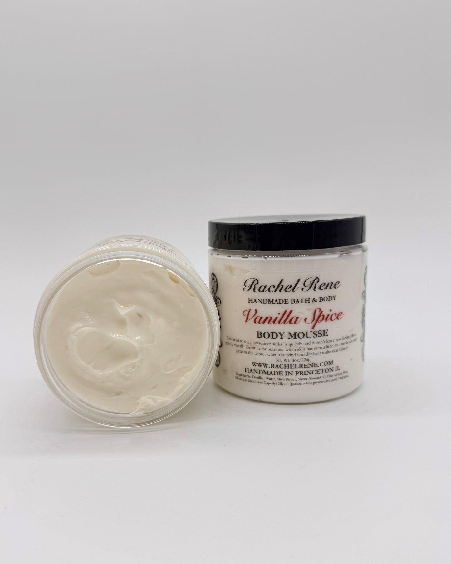 Vanilla Spice body mousse jar with open lid on a white background