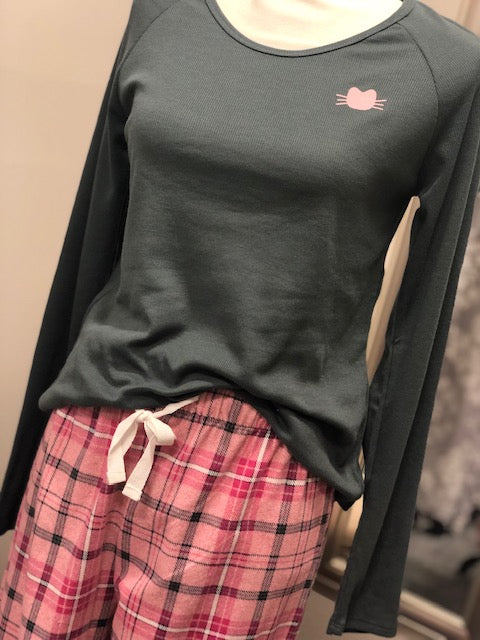 A dark gray long sleeve top with a small pink cat face on the upper right.