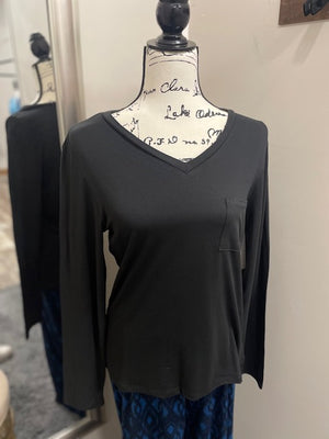 
            
                Load image into Gallery viewer, A black long sleeve v-neck with a pocket on the left breast.
            
        