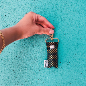 
            
                Load image into Gallery viewer, Gold Dots on Black LippyClip® Lip Balm Holder
            
        